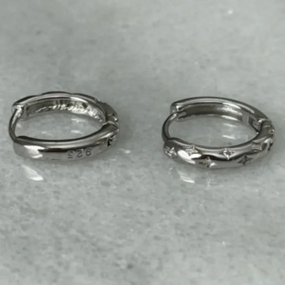 Sterling Silver Star Crystal Pave Hoop Earrings

Brand New - Picture 5 of 5